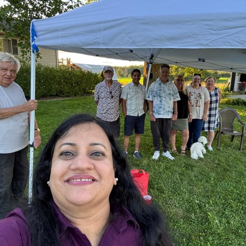 Guru Bhat with Ward 4 supporters at outdoor gathering