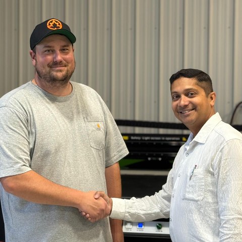 Guru Bhat meeting local business owner
